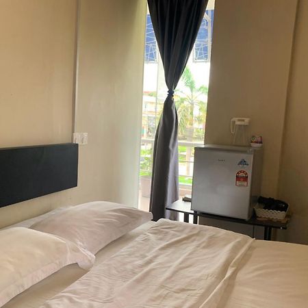 Ae Semporna Guesthouse 极潜旅店 Bagian luar foto