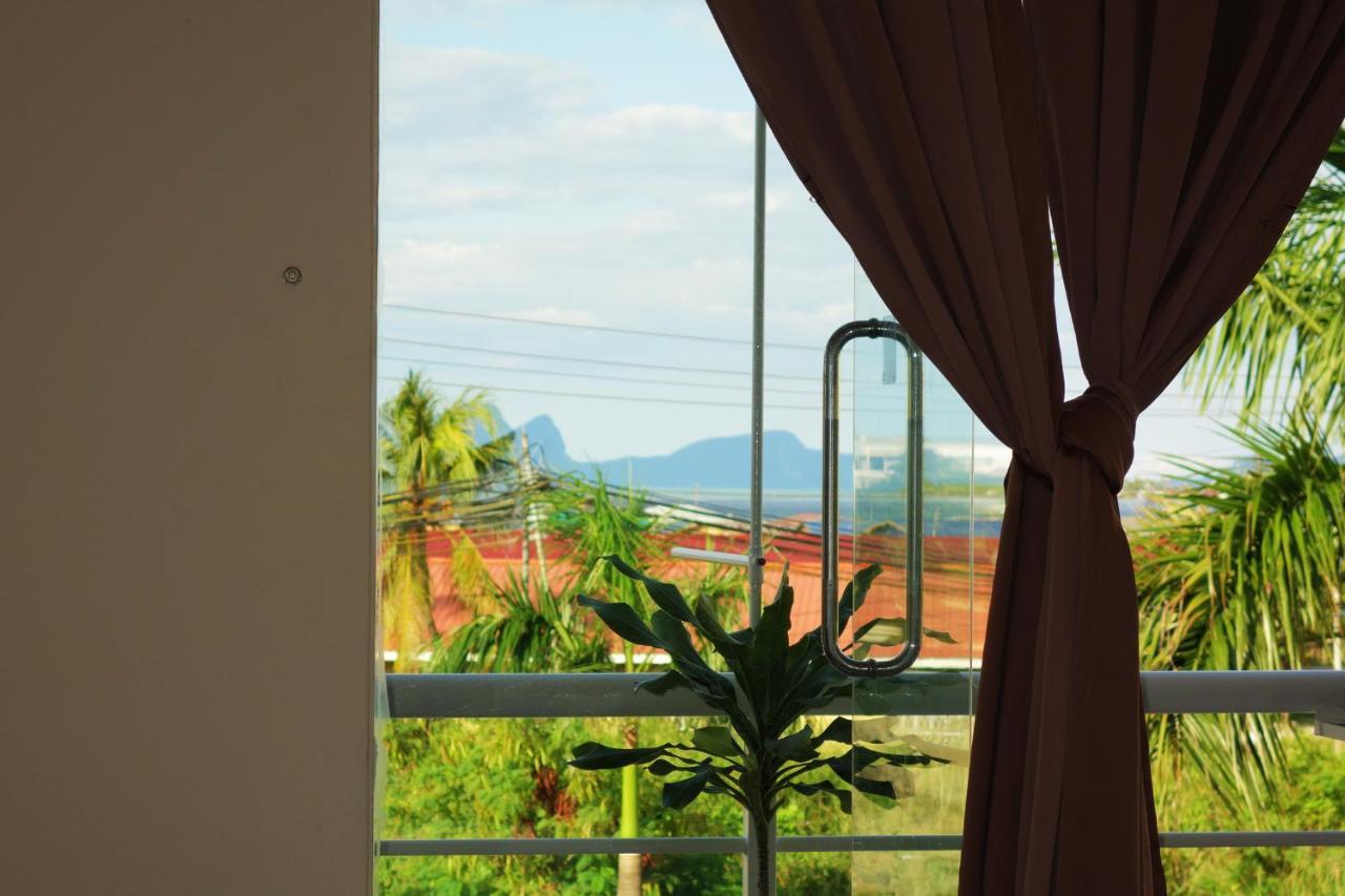 Ae Semporna Guesthouse 极潜旅店 Bagian luar foto