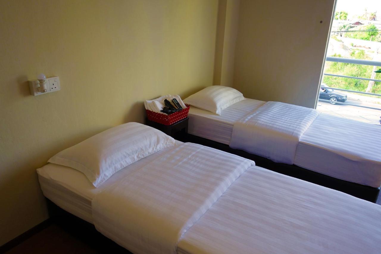 Ae Semporna Guesthouse 极潜旅店 Bagian luar foto