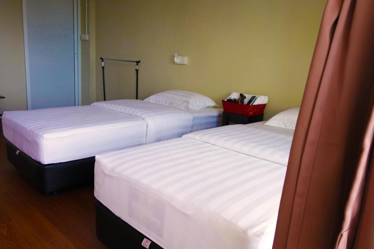 Ae Semporna Guesthouse 极潜旅店 Bagian luar foto