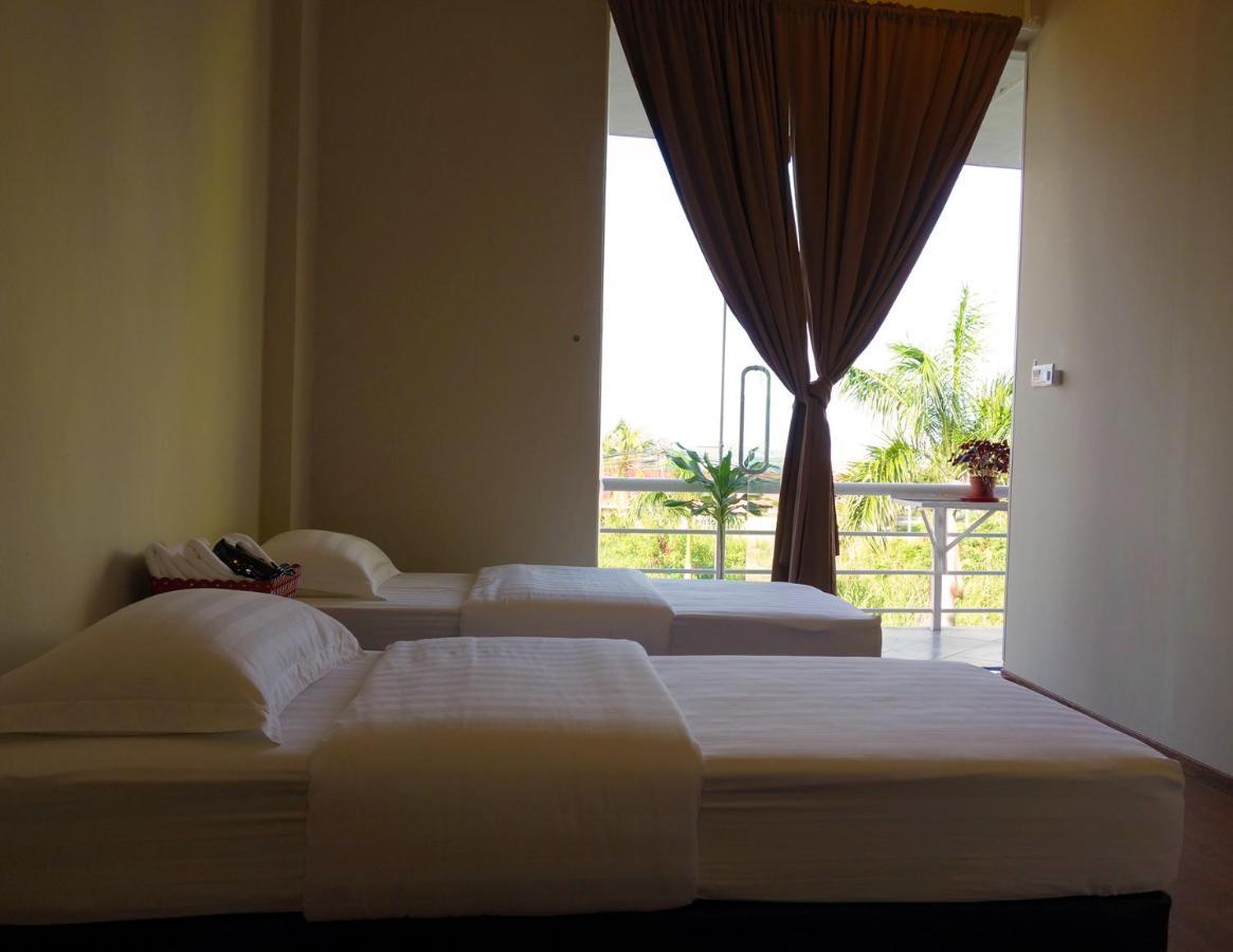 Ae Semporna Guesthouse 极潜旅店 Bagian luar foto