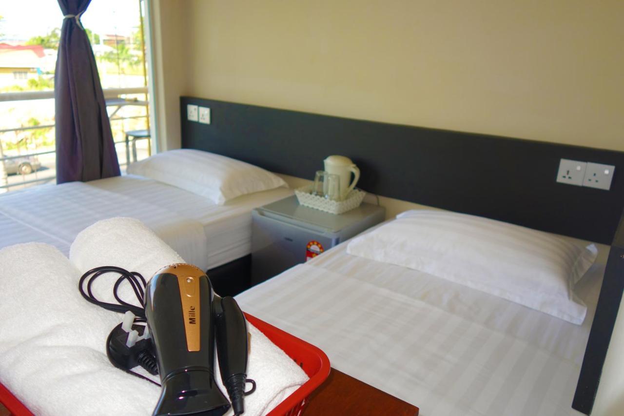 Ae Semporna Guesthouse 极潜旅店 Bagian luar foto