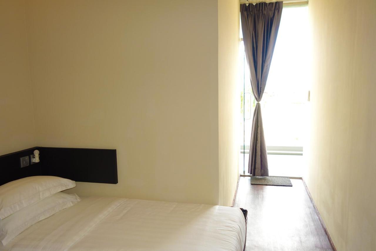 Ae Semporna Guesthouse 极潜旅店 Bagian luar foto