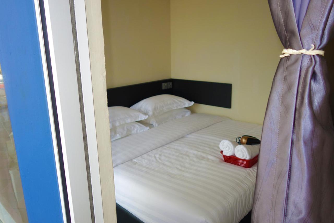 Ae Semporna Guesthouse 极潜旅店 Bagian luar foto