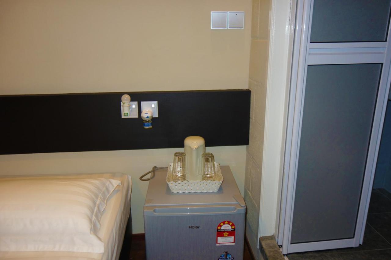Ae Semporna Guesthouse 极潜旅店 Bagian luar foto