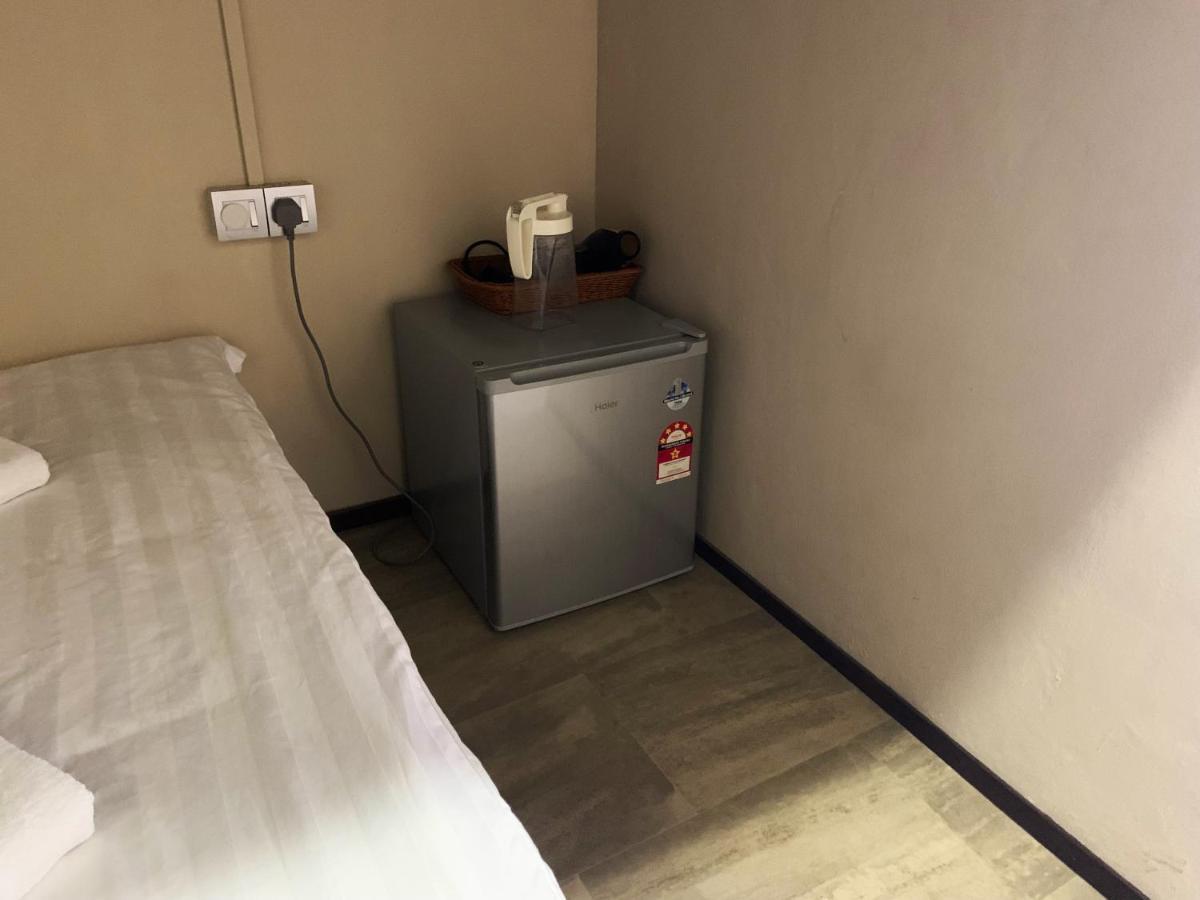 Ae Semporna Guesthouse 极潜旅店 Bagian luar foto