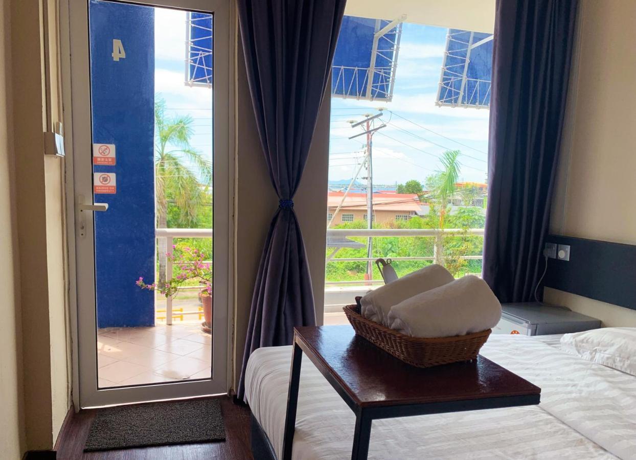 Ae Semporna Guesthouse 极潜旅店 Bagian luar foto