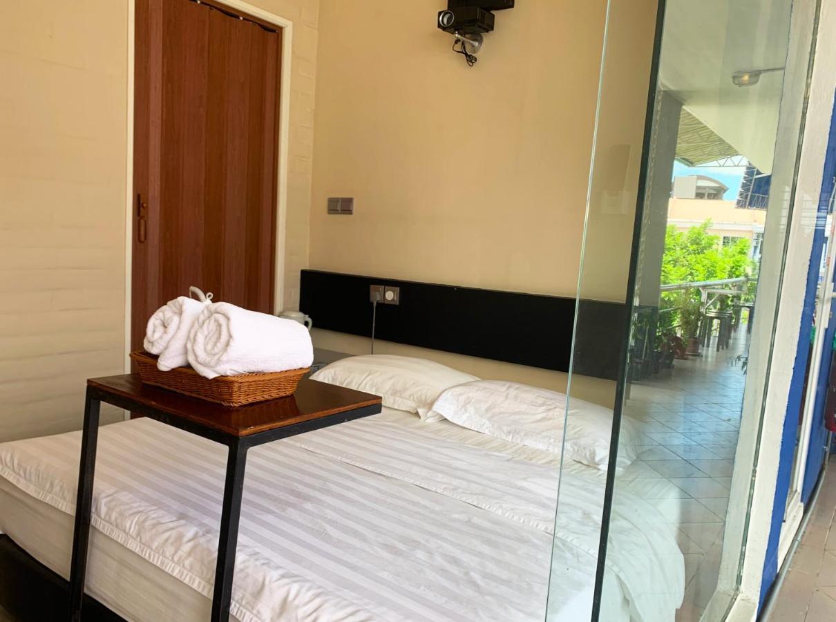 Ae Semporna Guesthouse 极潜旅店 Bagian luar foto